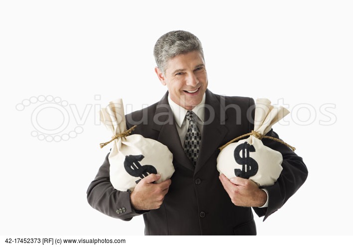 Image: Smiling businessman holding money bags